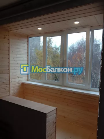 Отделка балконов деревянной вагонкой в Москве