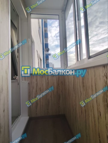 Отделка балкона и лоджии пластиковыми ПВХ панелями в Химках от компании МосБалкон