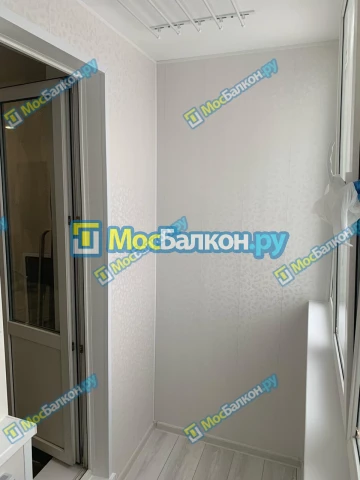 Отделка балкона и лоджии пластиковыми ПВХ панелями в Химках от компании МосБалкон