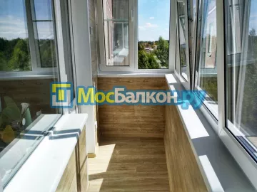 Отделка балкона и лоджии пластиковыми ПВХ панелями в Химках от компании МосБалкон