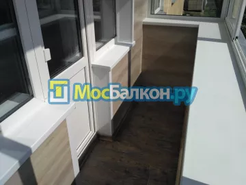 Отделка балкона и лоджии пластиковыми ПВХ панелями в Химках от компании МосБалкон