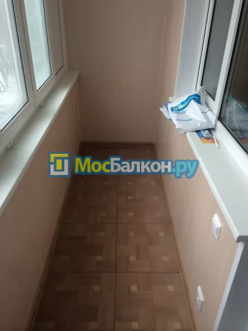 Отделка балкона и лоджии пластиковыми ПВХ панелями в Химках от компании МосБалкон