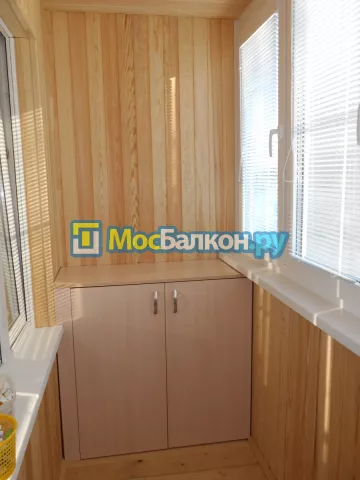 Отделка балконов деревянной вагонкой в Москве